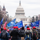 Trump supporters marching towards the Capitol Building on January 6, 2021. Following the attempted insurrection, multiple companies including Amazon said they would stop PAC donations to election denying politicians. Turns out, that funding moratorium wasn’t intended to be permanent.